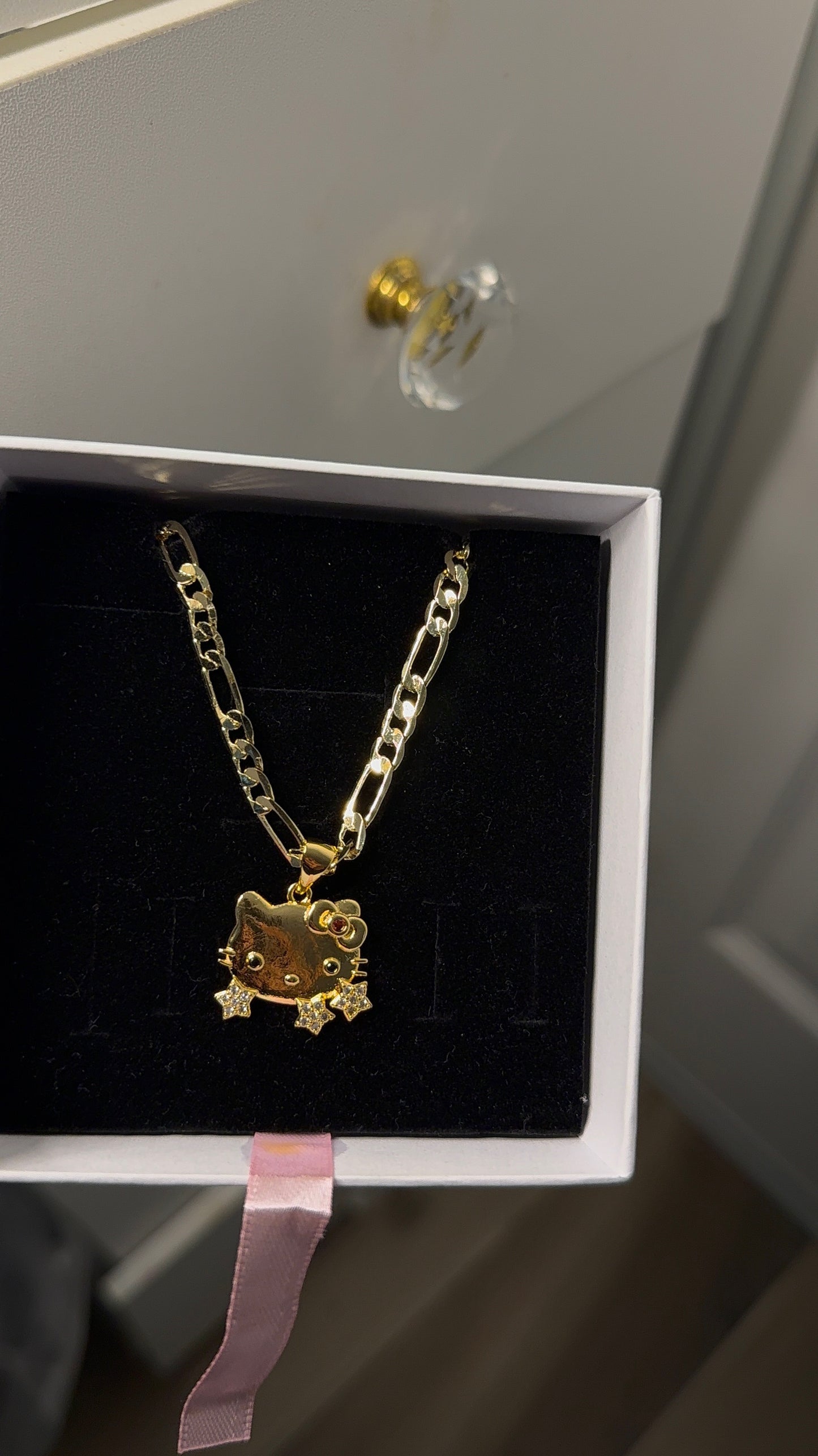 HK star pendant with Figaro necklace