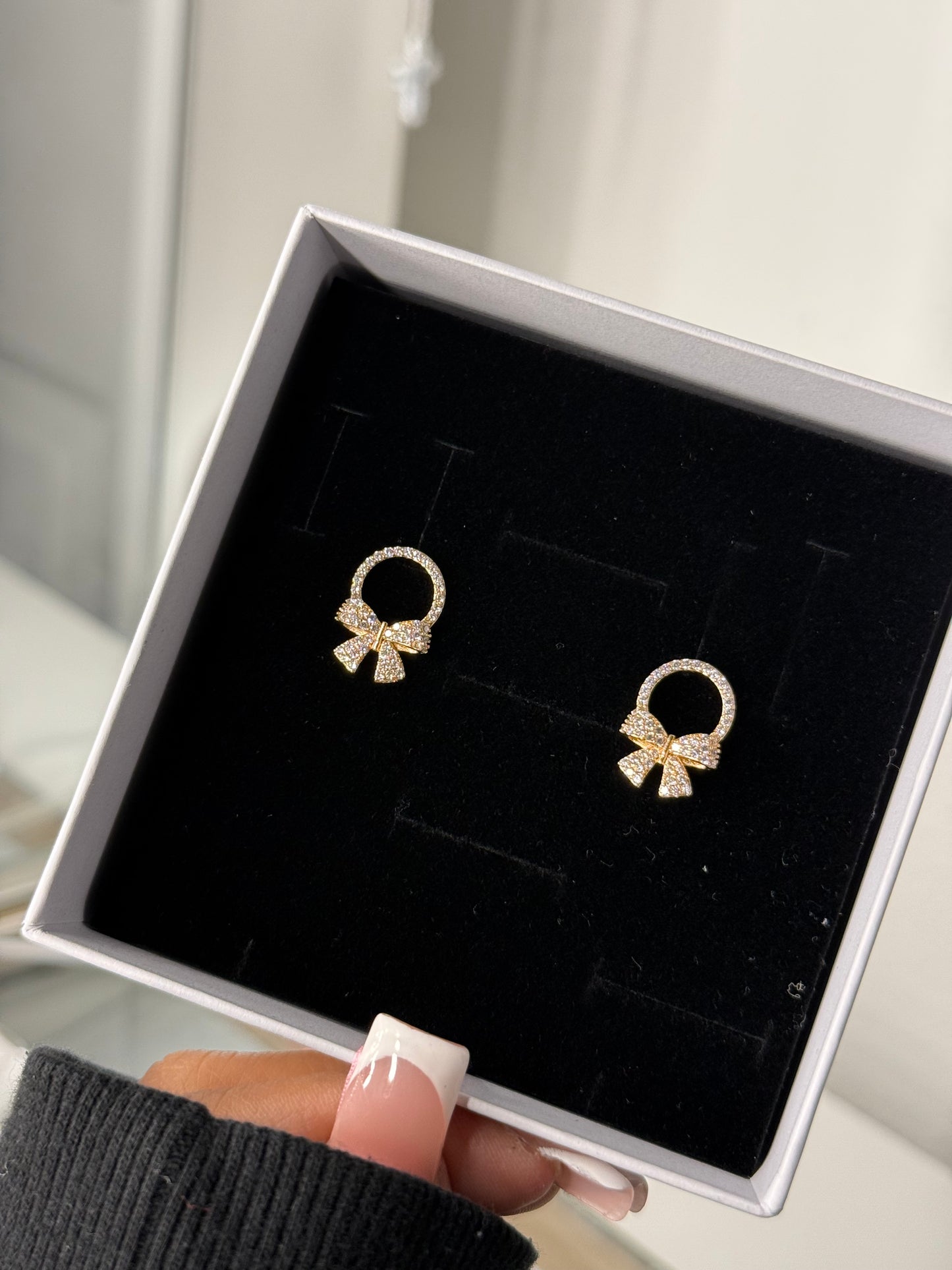 Bedazzled Gold plated bow earrings