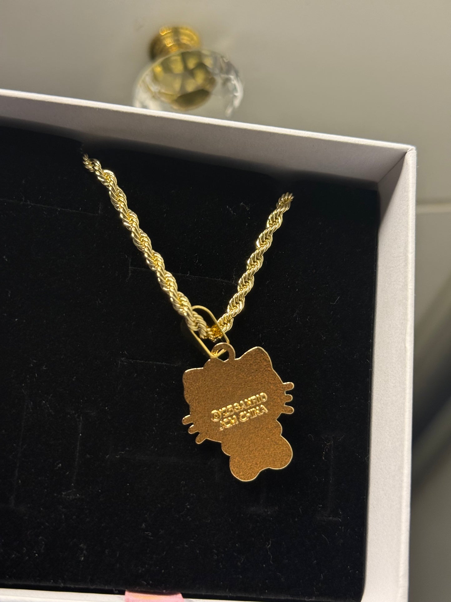Gold plated hk pendant with rope chain