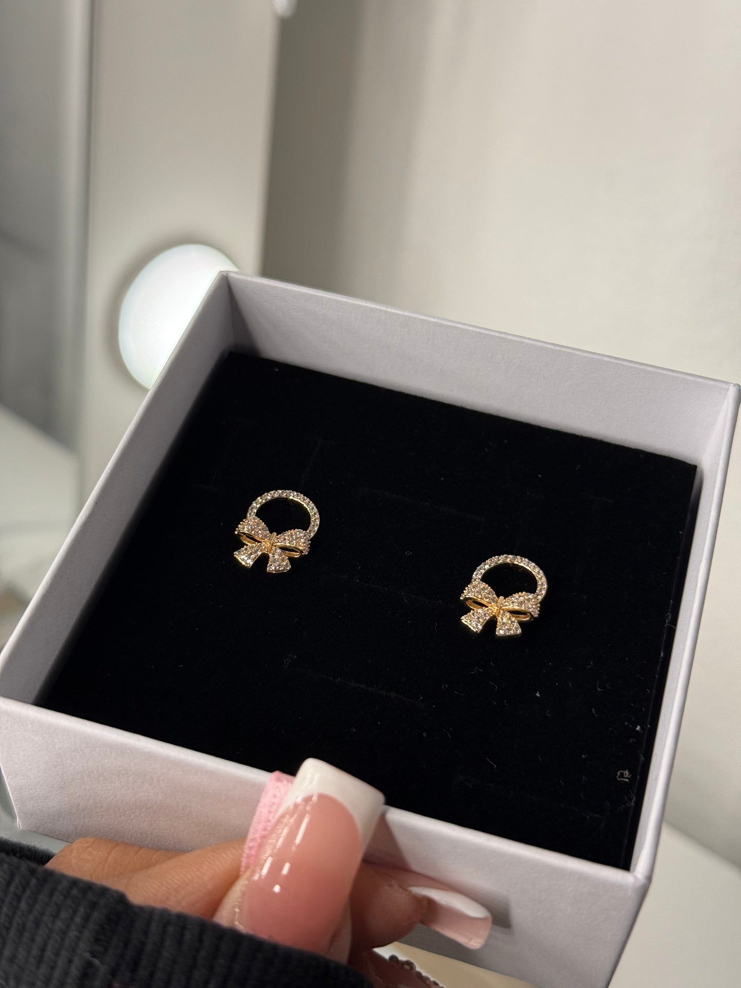Bedazzled Gold plated bow earrings