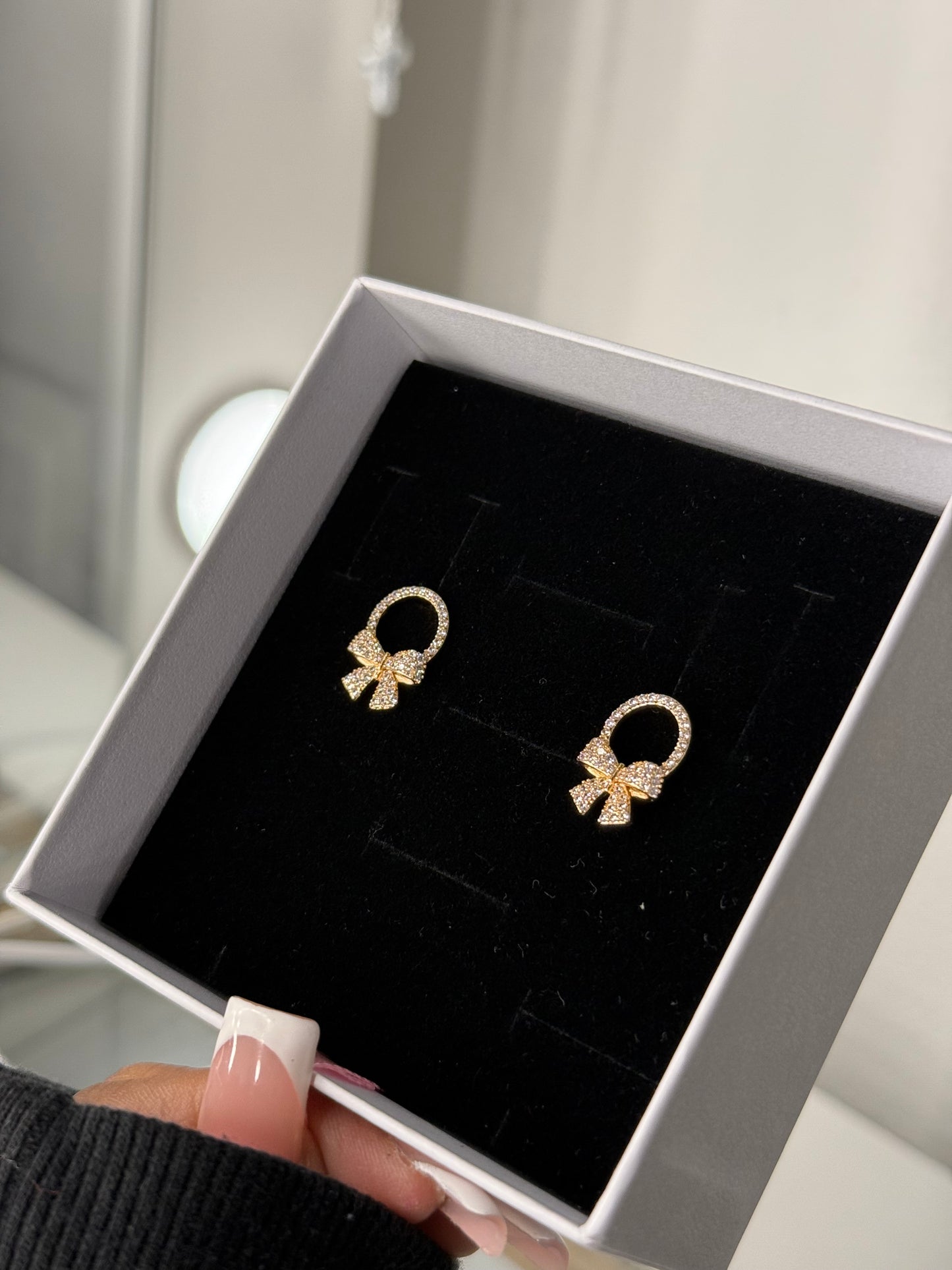 Bedazzled Gold plated bow earrings
