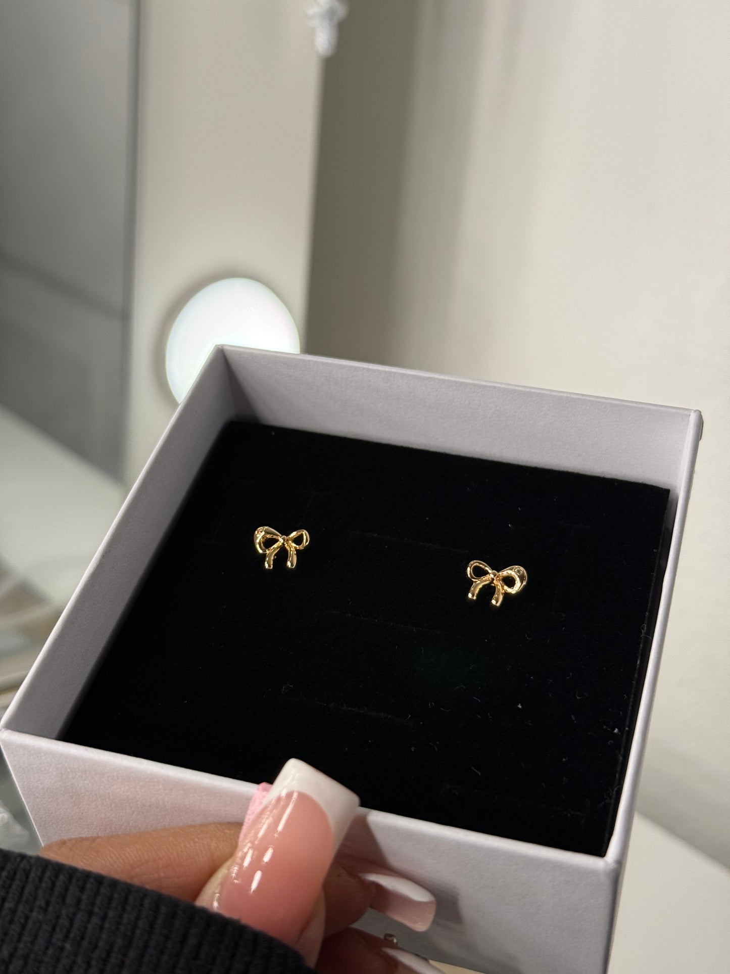 Gold plated bow earrings