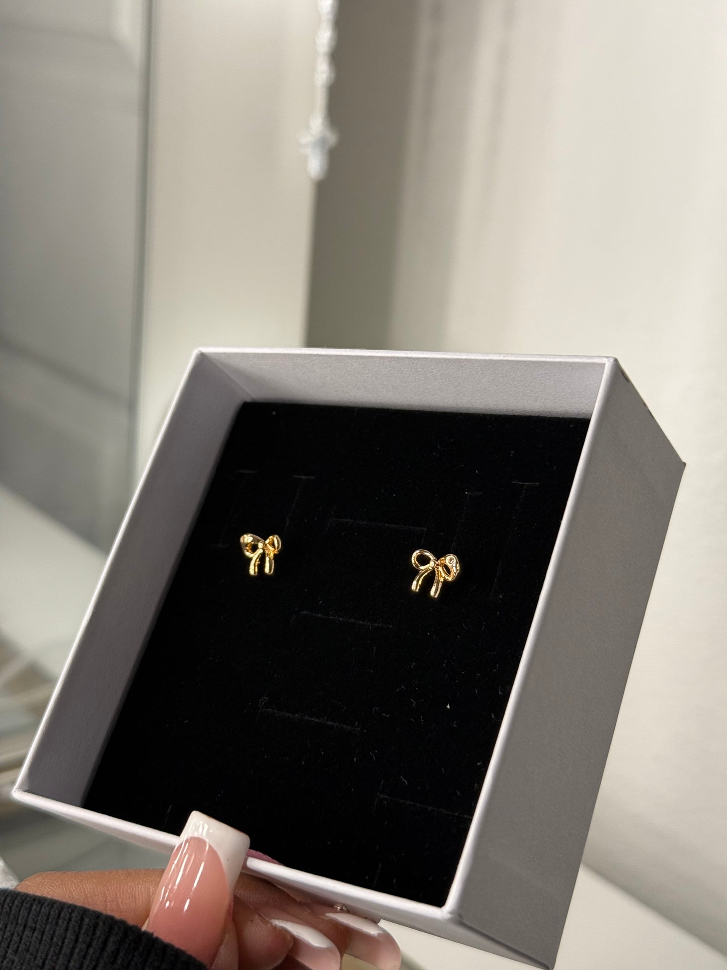 Gold plated bow earrings