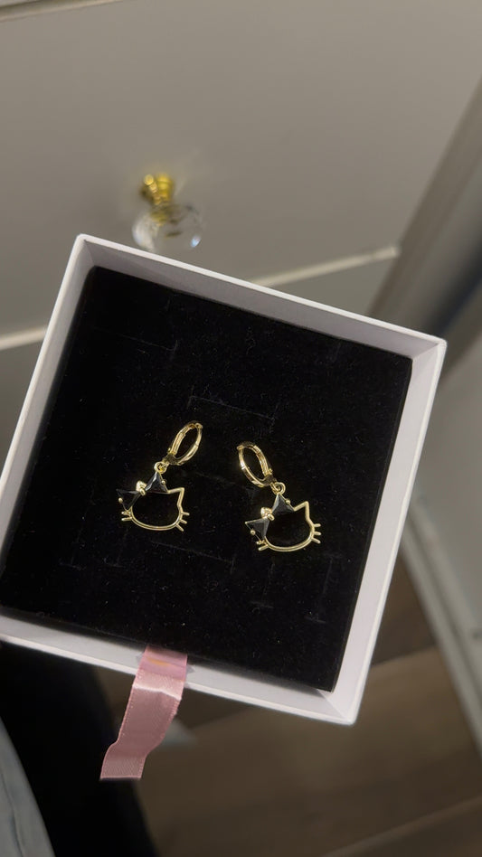 Black Hk Huggie earrings