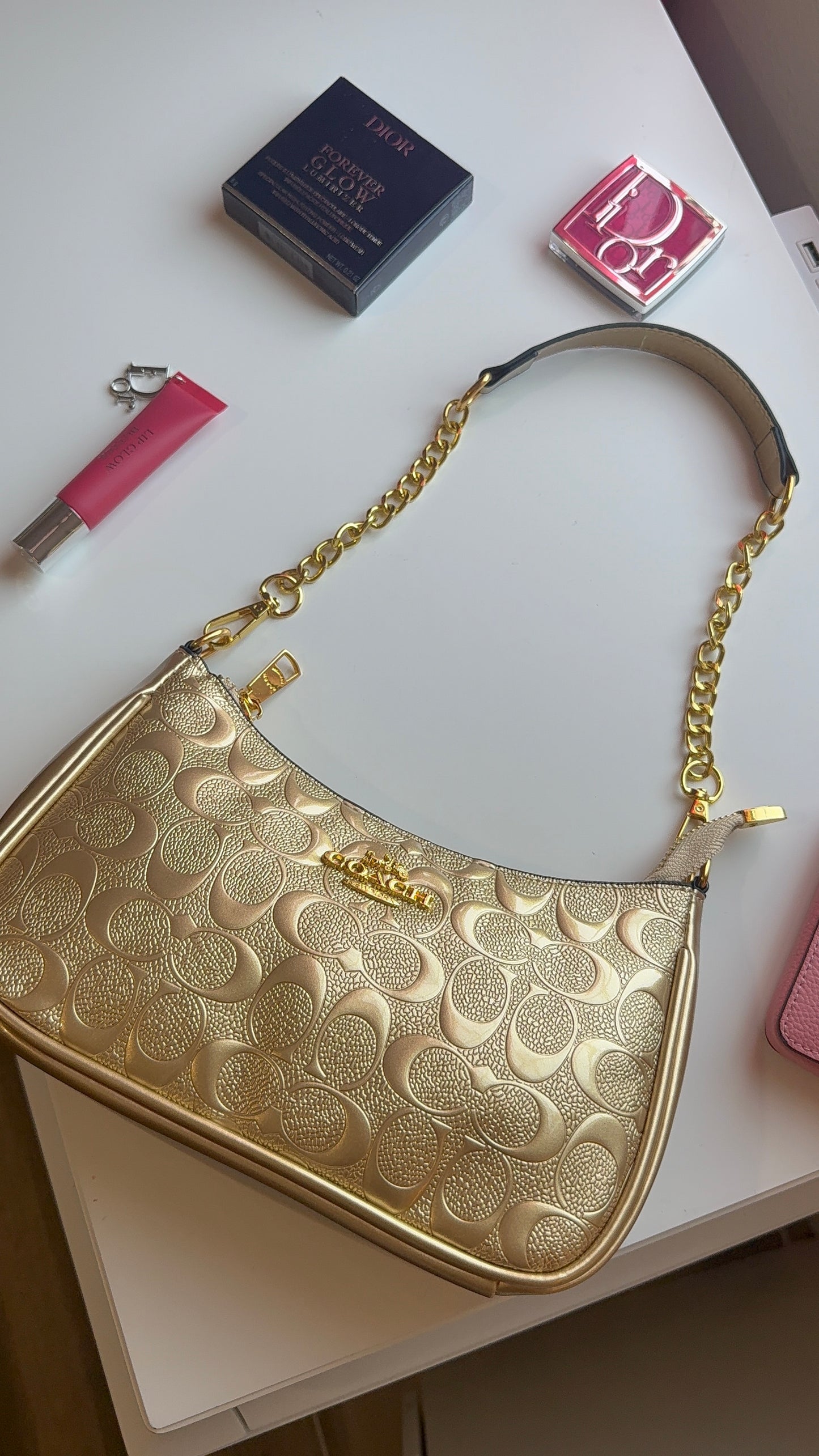 Gold toned purse
