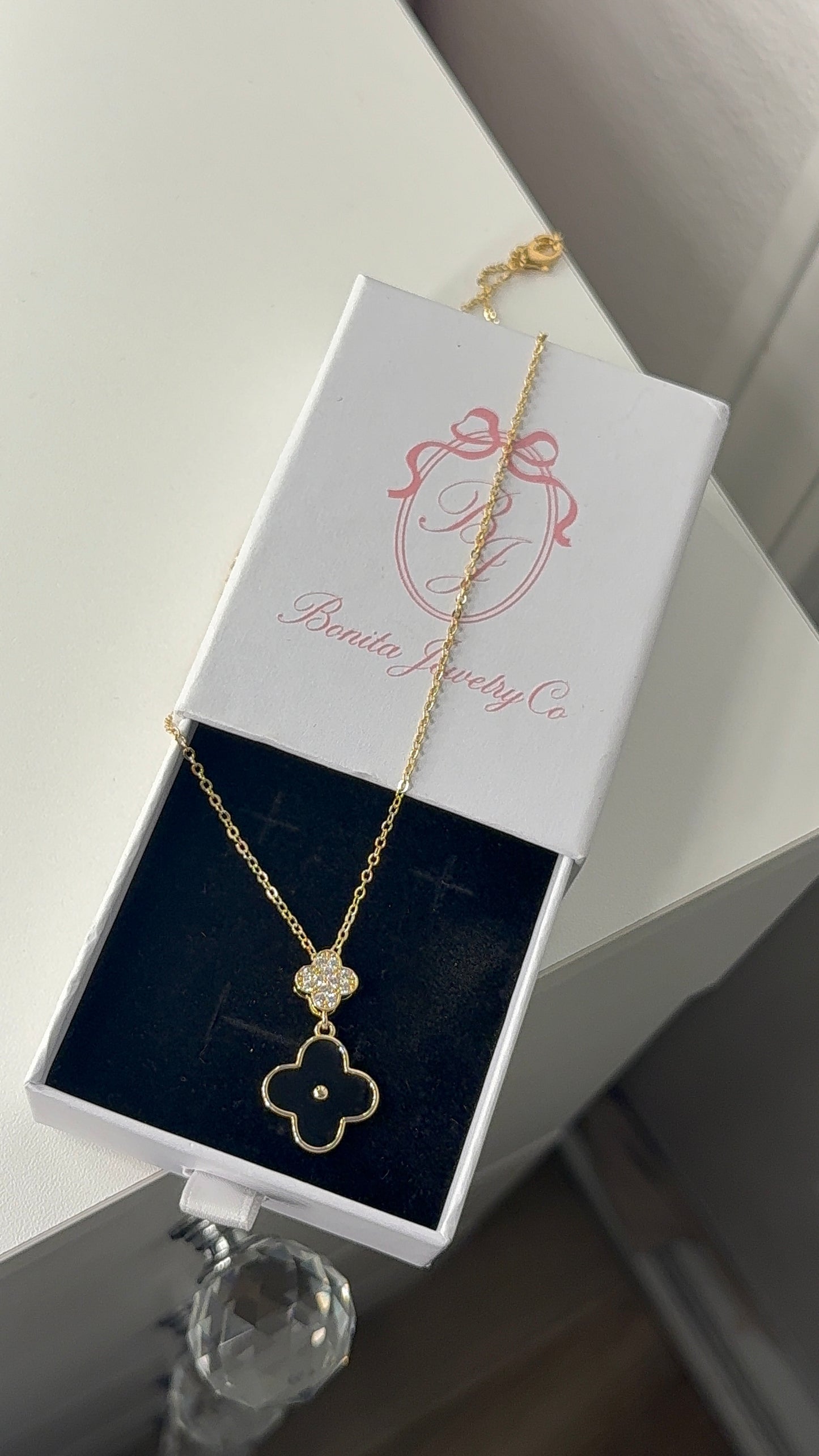 Black clover necklace