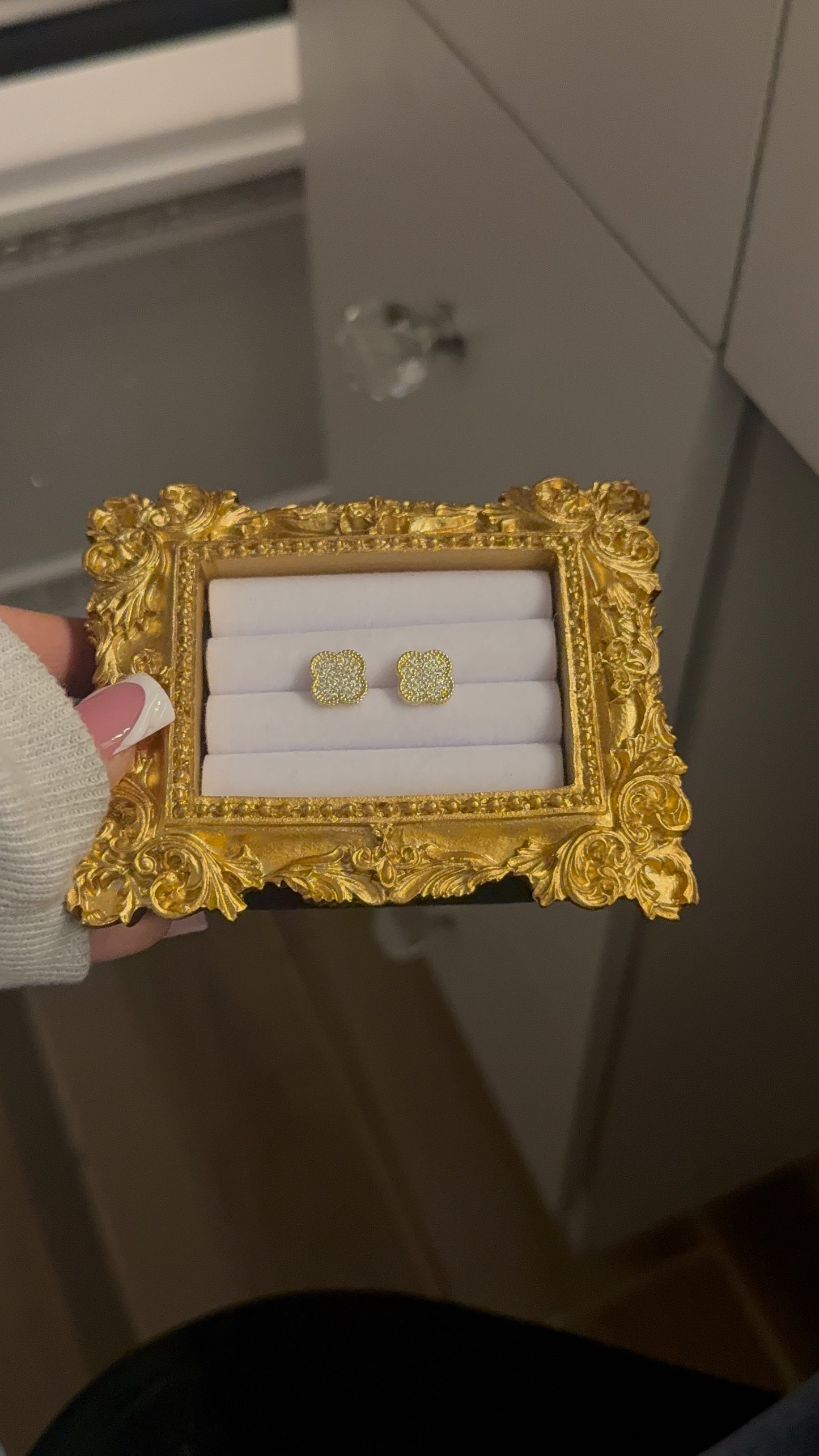 Small gold toned clover earrings